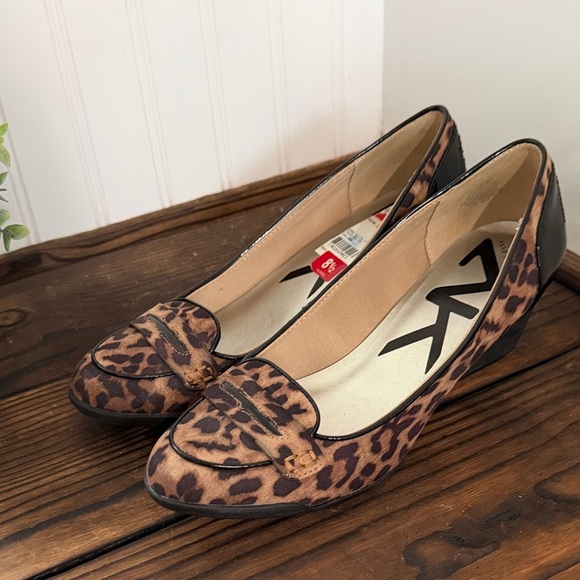 Anne Klein Shoes - Anne Klein Sport Women's Tagalong wedge pumps in a leopard print pattern.
